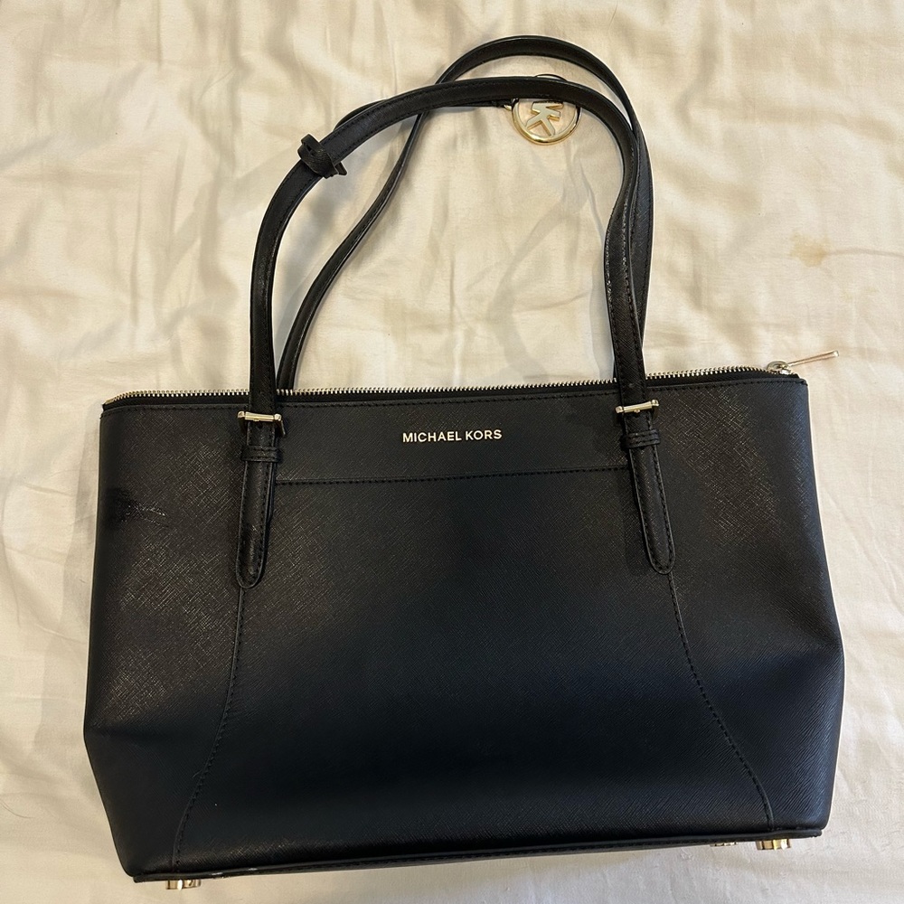 Michael Kors Black leather purse. Used a few times. Real.